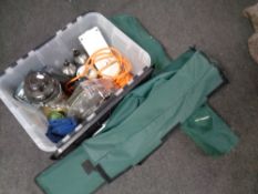 A folding camping chair and bed in carry bag together with a crate containing wind-up radio,