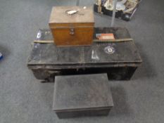 An antique tin trunk bearing Cunard line labels,