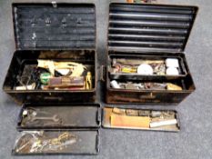Two vintage metal tool boxes containing tools and hardware