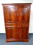 A mahogany Regency style cocktail cabinet