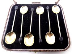 A cased set of six silver gilt coffee spoons