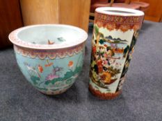 A Chinese style fishbowl planter decorated with herons together with a Japanese style stick pot