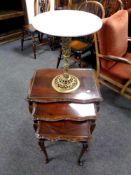 A brass and marble wine table together with a nest of tables