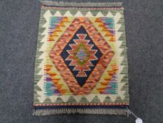A Chobi kilim 55cm by 47cm