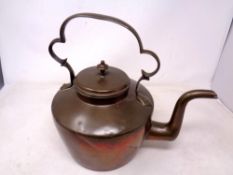 A Victorian copper kettle