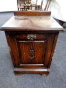 A 19th century oak fall fronted coal receiver with liner