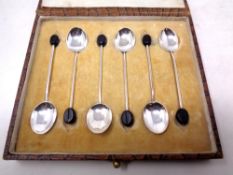 A cased set of six silver coffee spoons