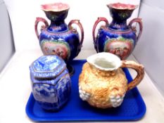 A tray of Ringtons blue and white caddy, pair of antique transfer printed vases,