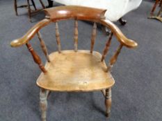 A 19th century elm and beech smoker's armchair