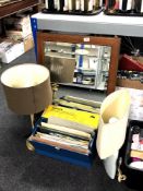 A contemporary bevelled mirror together with two table lamps and filing box