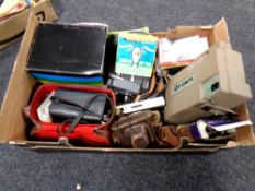A box of vintage Halina camera,