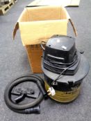 An Aqua vacuum with accessories