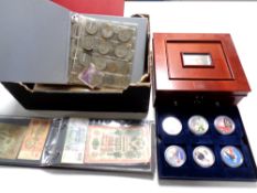 A box of commemorative coins, folder containing world bank notes, Nigeria, Turkey etc,