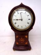 A balloon shaped mantel clock in inlaid case with movement signed Richard and co.