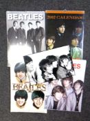 The Beatles on their first trip to the US during an interview at LA airport August 1964 photograph,