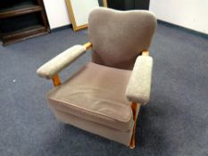A pair of 20th century beech framed club armchairs (brown and blue)