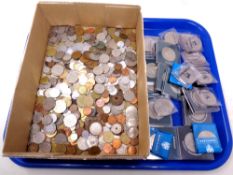 A tray of commemorative crowns,