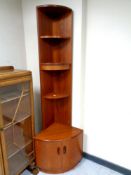 A mid century G-plan teak open corner unit