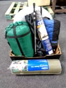 A box of camping equipment, pop-up tent, sleeping bag, walking poles, camping mat,