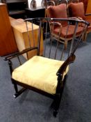 A stained beech rocking chair