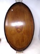 An inlaid mahogany twin handled serving tray