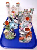 A tray of six Staffordshire spill vases