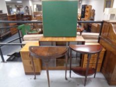 A set of 20th century teak sliding glass door bookshelves together with two three drawer bedside