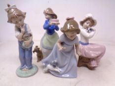 Four Nao figures of girls