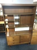 A mid century display unit / room divider in teak finish