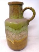 A glazed stoneware flagon