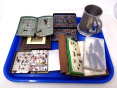 A tray of seven fly wallets,