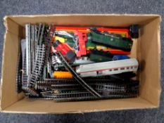 A box containing 00 gauge rolling stock and track