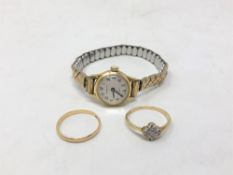 An 18ct gold diamond set ring and an 18ct gold band ring.