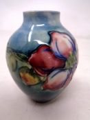 A Moocroft clematis vase, height 9 cm.