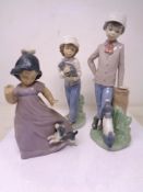 Three Nao figures with dogs