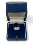 An 18ct gold diamond cluster ring