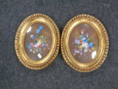 A pair of gilt framed still life oil paintings.