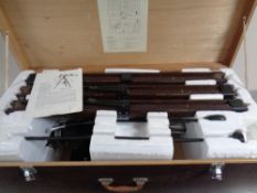 A mid-century equatorial refractor telescope in fitted case.