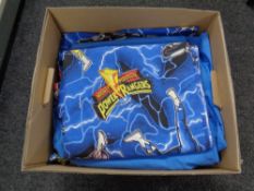 A box containing Newcastle United curtains, three rolls of Newcastle United wallpaper boarder,