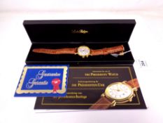 A gent's Louis Philippe wristwatch on brown leather strap