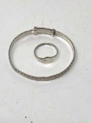 A silver child's ring and bangle