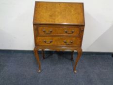 A lady's walnut bureau.