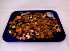 A tray of coins, mostly copper British,