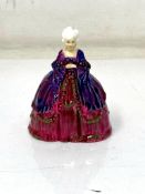 A rare Royal Doulton figure - HN 654, Crinoline Lady, circa 1930, red and purple, height 7.6 cm.