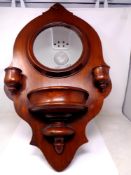 An Edwardian mahogany hall mirror