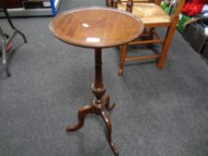 A reproduction mahogany wine table.