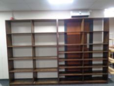 A stained pine open bookcase.