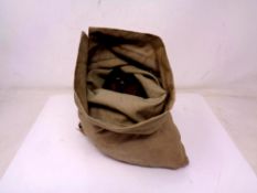 A large money bag containing a large quantity of copper British coins,