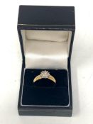 An 18ct gold diamond cluster ring