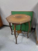 An Edwardian beech occasional table together with a folding card table.